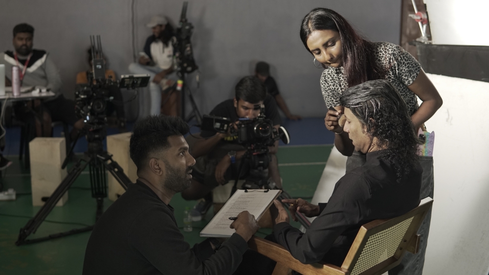 Behind the scenes: Director Vicram (left) and Darkkey (seated) during the shoot for the upcoming film in April 2026. — Picture by Kirran Prashaanth