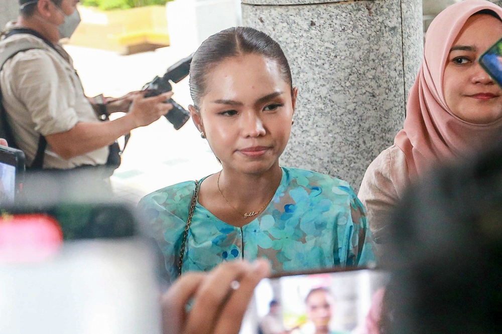 Actress and singer Bella Astillah speaks to the press following Muar MP Syed Saddiq Syed Abdul Rahman’s acquittal of four corruption and money laundering charges at the Palace of Justice, Putrajaya today. — Picture by Sayuti Zainudin