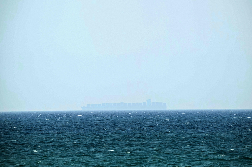 A huge tanker sails past Khasab, on northern Oman’s Musandam Peninsula, in the Strait of Hormuz June 24, 2025. — AFP pic 