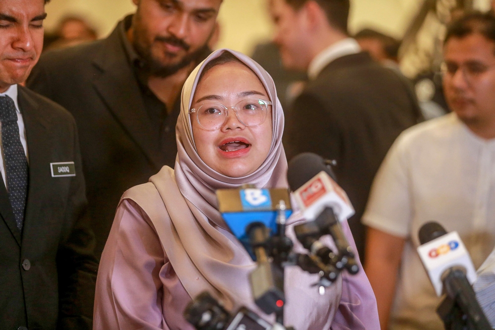 United Democratic Alliance (MUDA) acting president Amira Aisya Abdul Aziz speaks to the press after Muar MP Syed Saddiq Syed Abdul Rahman was acquitted of four charges of corruption and money laundering at the Palace of Justice, Putrajaya, today. — Picture by Sayuti Zainudin