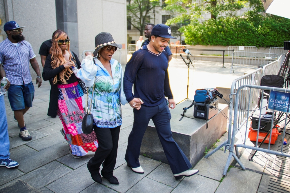 Janice Combs, mother of Sean 'Diddy' Combs, and her grandson Justin Combs depart federal court during the sex trafficking and racketeering conspiracy trial at U.S. court in Manhattan, in New York City, U.S., June 23, 2025. — Reuters pic