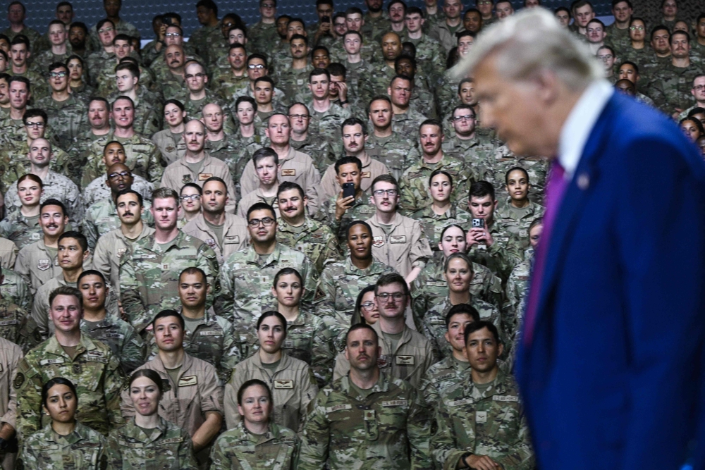 File picture of US President Donald Trump arriving to address troops at the Al-Udeid air base south-west of Doha on May 15, 2025. Trump Wednesday likened Washington’s strike on Iran’s nuclear facilities to the US dropping of atomic bombs on the Japanese cities of Hiroshima and Nagasaki to end World War II. — AFP pic 