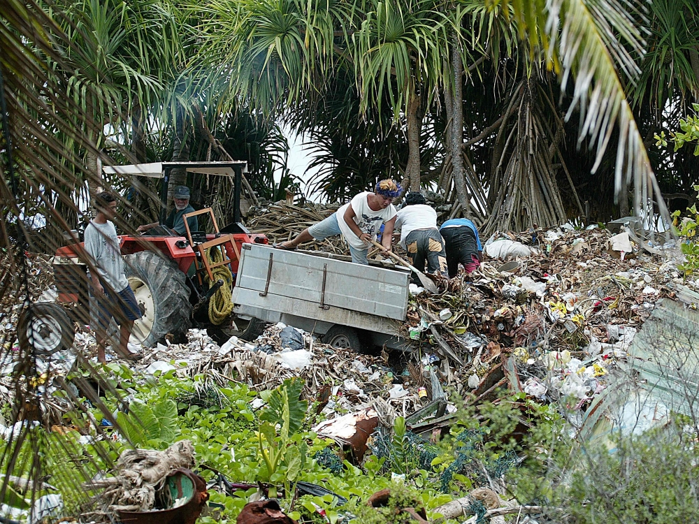 Domestic garbage being used to reinforce a sea wall against the rising sea on Funafuti Atoll, home to nearly half of Tuvalu’s entire population of 11,500, as king tides threaten to inundate the tiny island nation. — AFP pic