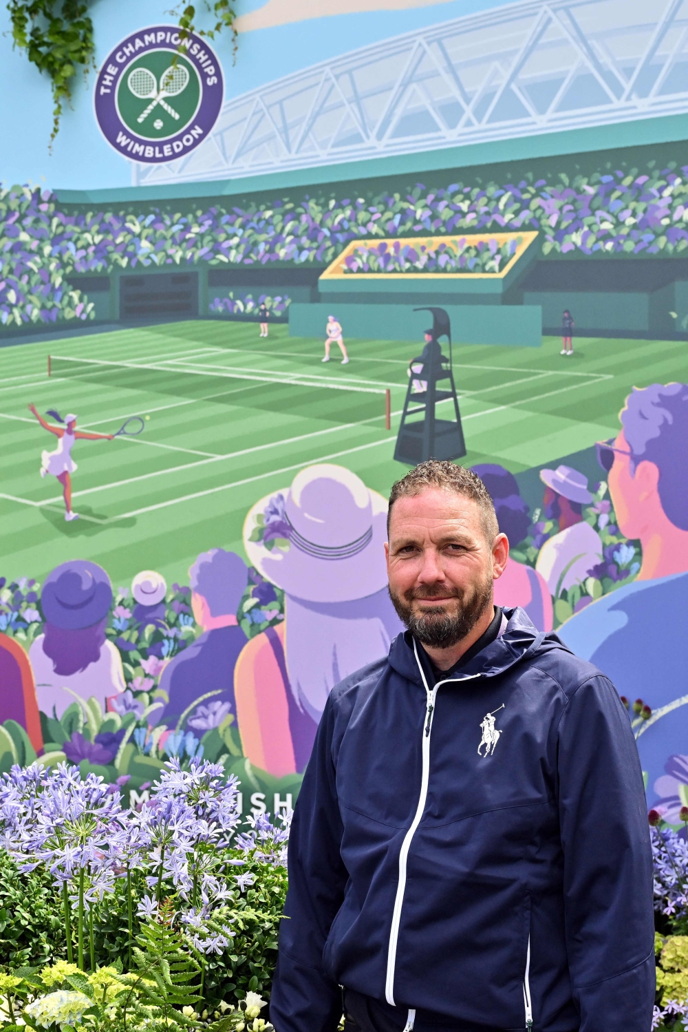 Wimbledon head gardener Martyn Falconer is the only man at the All England Club who welcomes a drop of rain. — AFP pic