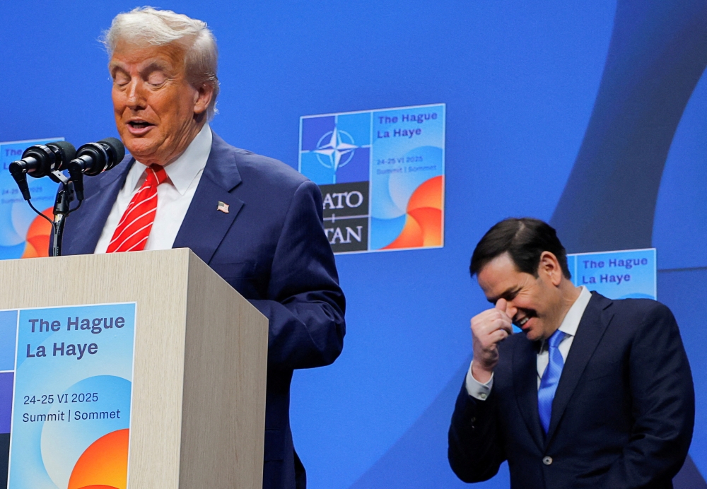US President Donald Trump speaks at a press conference, as Secretary of State Marco Rubio reacts to a Sky News reporter’s question about Nato Secretary General Mark Rutte calling President Trump ‘daddy’, at the Nato summit in The Hague, Netherlands, June 25, 2025. — Reuters pic
