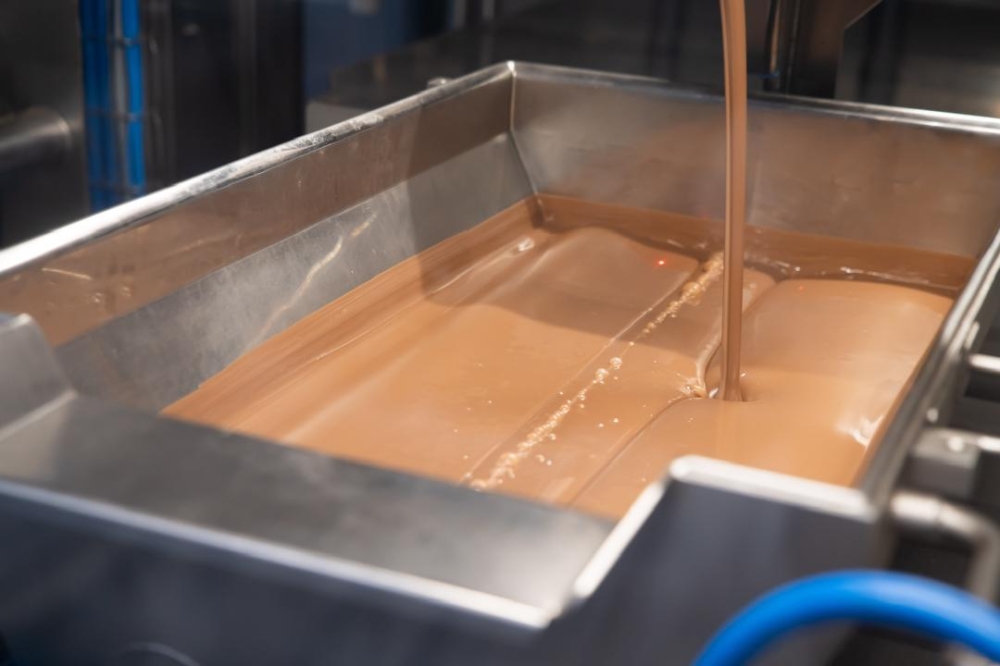 Tempering allows the chocolate to stabilise through heating and cooling for consistency in texture, colour and flavour, before it is poured into the mould. — Picture courtesy of Mondelez International