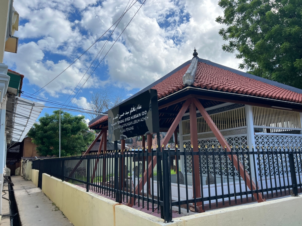 The mausoleum of Tunku Syed Hussain and his family members is next to the mosque. — Picture by Opalyn Mok