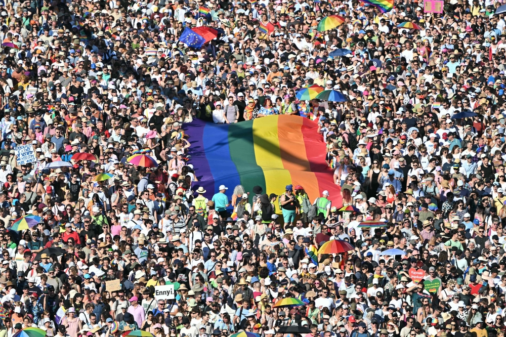 People take part in the Budapest Pride parade in Budapest downtown on June 28, 2025, as the capital’s municipality organised this march by the LGBTQ community, celebrating freedom, in a move to circumvent a law that allows police to ban LGBTQ marches. — AFP pic