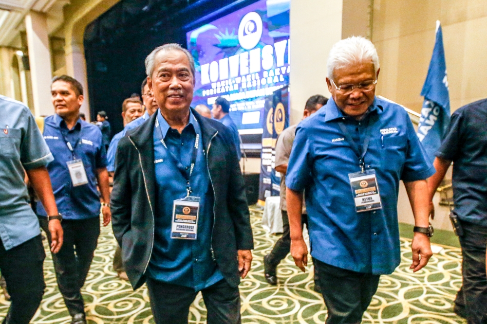 Datuk Seri Hamzah Zainuddin (right)  has denied that he is pushing Perikatan Nasional chairman Tan Sri Muhyiddin Yassin away from leading the Opposition. — Picture by Hari Anggara.