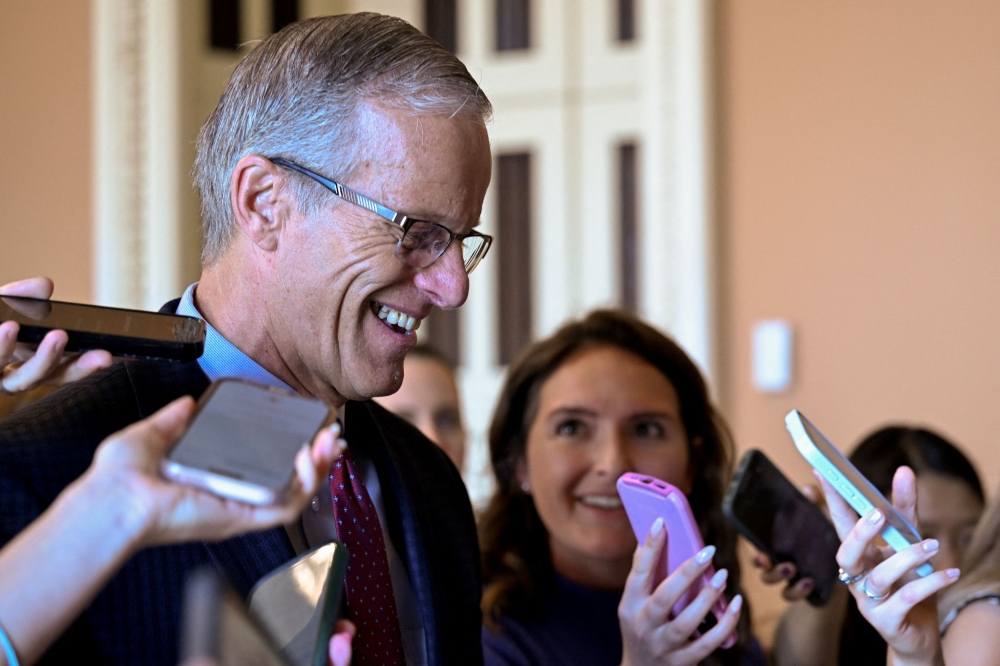 US Senate Majority Leader John Thune (R-SD) speaks to the media, after a Senate GOP lunch, as Republican lawmakers struggle to pass US President Donald Trump’s sweeping spending and tax Bill, on Capitol Hill in Washington June 28, 2025. — Reuters pic