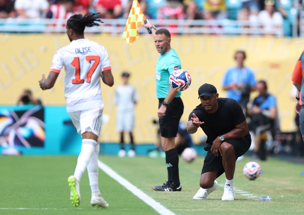 Bayern Munich coach Vincent Kompany gives the ball to Bayern Munich’s Michael Olise at Hard Rock Stadium, Miami Gardens, Florida, June 29, 2025. — Reuters pic 