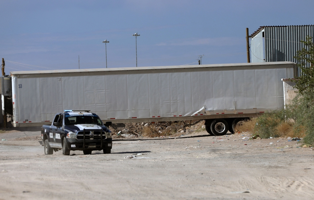 A Municipal Police vehicle remains outside the crematorium where authorities found 381 corpses embalmed in Ciudad Juarez, Chihuahua state, Mexico, on June 29, 2025. — AFP pic 