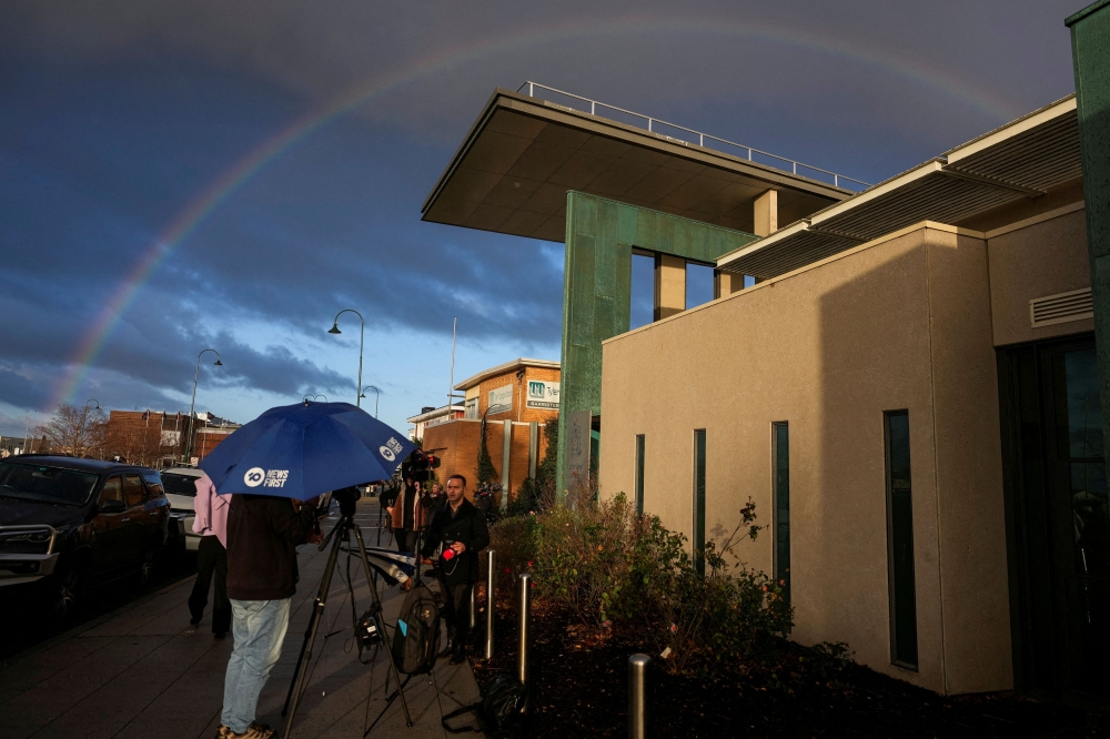 Members of the media stand outside the Latrobe Valley Law Courts where the Erin Patterson murder trial takes place in Morwell, Australia, June 25, 2025. — Reuters pic 
