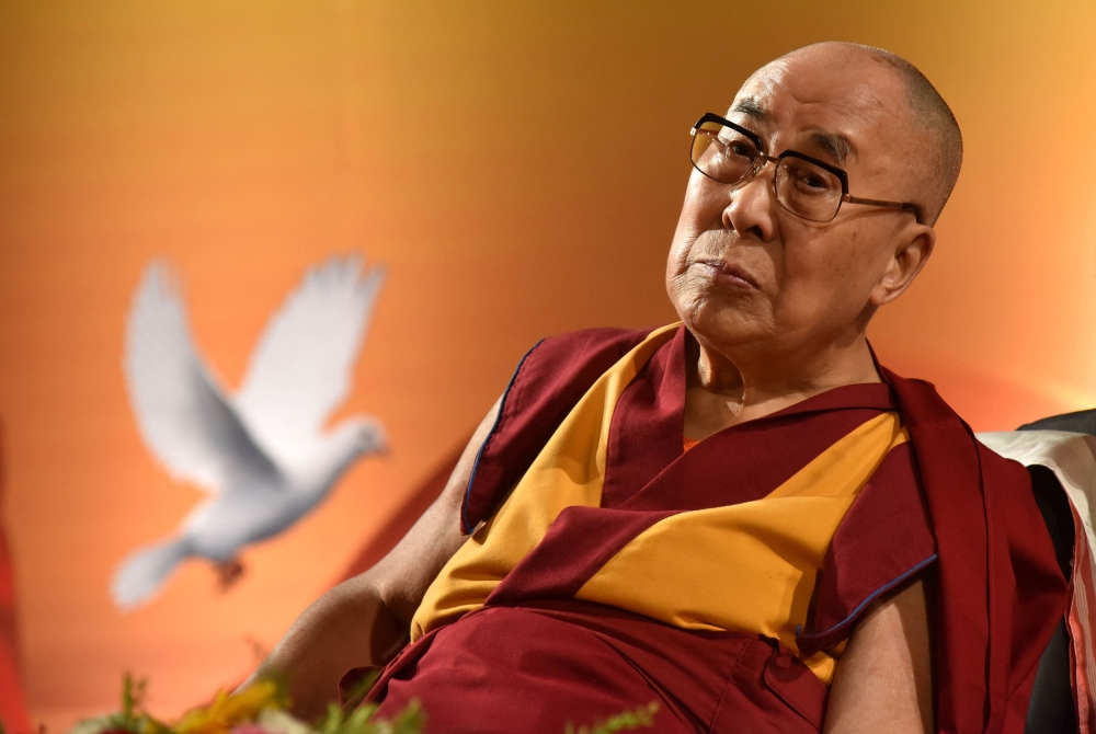 Tibetan spiritual leader the Dalai Lama looks on during an event for The Assam Tribune and Dainik Asam newspapers in Guwahati on April 1, 2017. The choice of a successor to the Dalai Lama, the spiritual head of Tibetan Buddhists, is a matter of riveting interest not only for followers of his religion, but also China, India, and the United States, for strategic reasons. — AFP pic