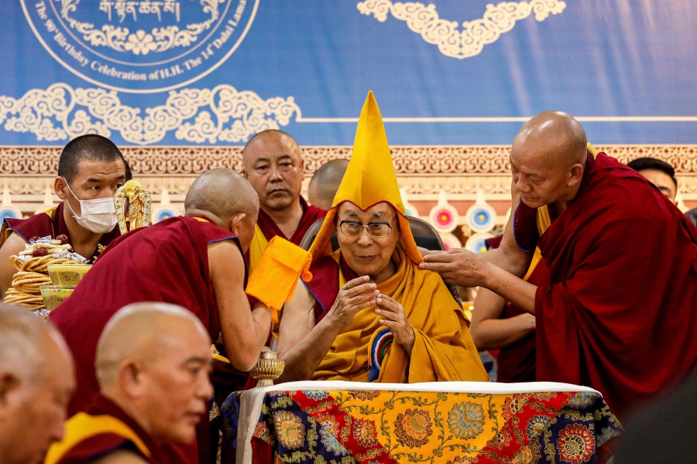 Tibetan spiritual leader the Dalai Lama (centre) attends a Long Life Prayer offering ceremony at the Main Tibetan Temple in McLeod Ganj, near Dharamsala on June 30, 2025. — AFP pic