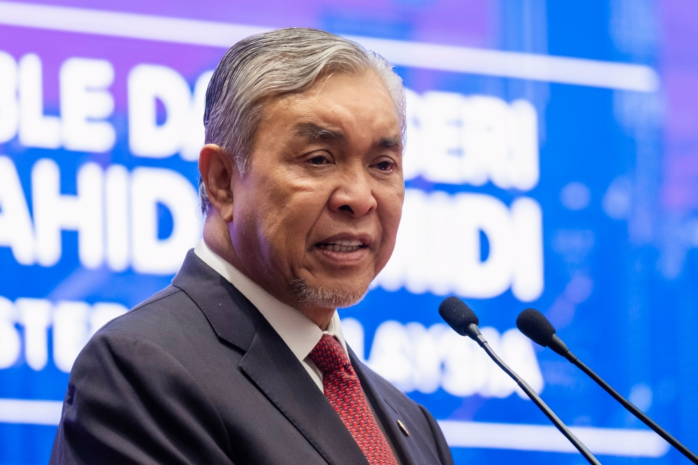 Deputy Prime Minister Datuk Seri Ahmad Zahid Hamidi speaks at the Cyber Defence and Security Exhibition and Conference (CYDES 2025) at the Putrajaya International Convention Centre (PICC) in Putrajaya July 1, 2025. — Bernama pic