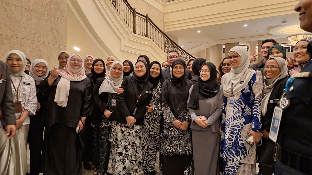 Court staff bids farewell to Chief Justice Tun Tengku Maimun Tuan Mat, who will be retiring tomorrow, at the Palace of Justice July 1, 2025. — Picture by Ida Lim