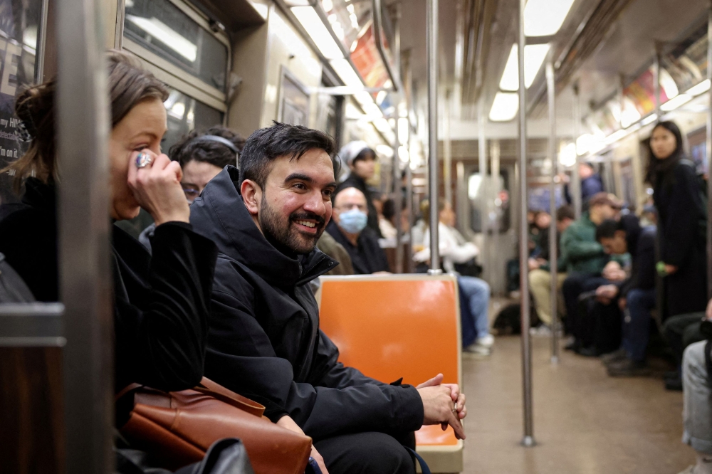 Candidate for New York City mayor Zohran Mamdani rides the subway following a campaigning stop in New York City, April 1, 2025. — Reuters pic 