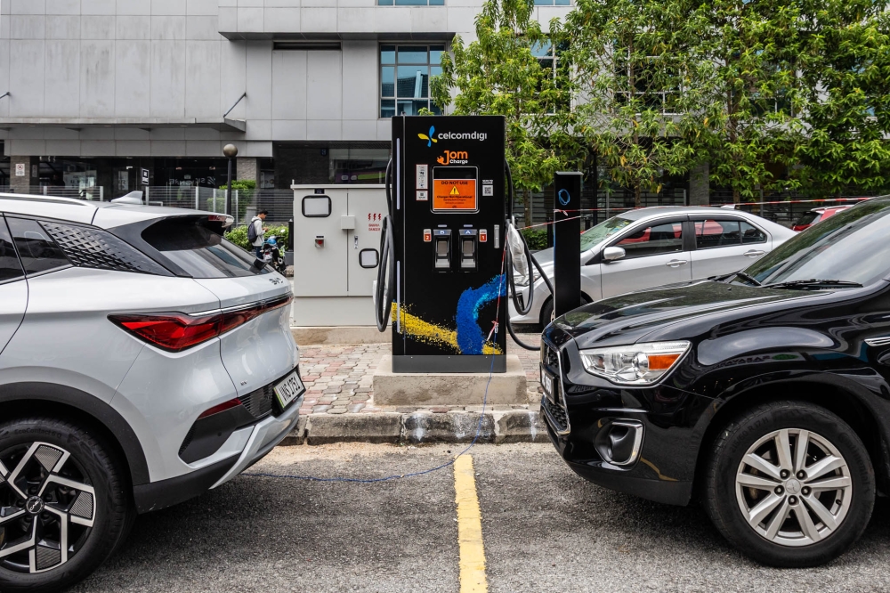 Segambut MP Hannah Yeoh is urging DBKL to clarify its EV charger placement rules after TTDI residents raised concerns over lost public parking spaces. — Picture by Firdaus Latif