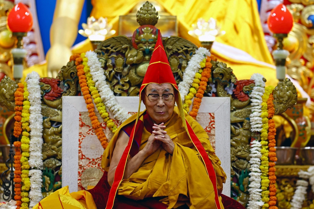 Tibetan spiritual leader the Dalai Lama attends a long-life prayer offering ceremony at the Main Tibetan Temple in McLeod Ganj, near Dharamsala, July 5, 2025. — AFP pic