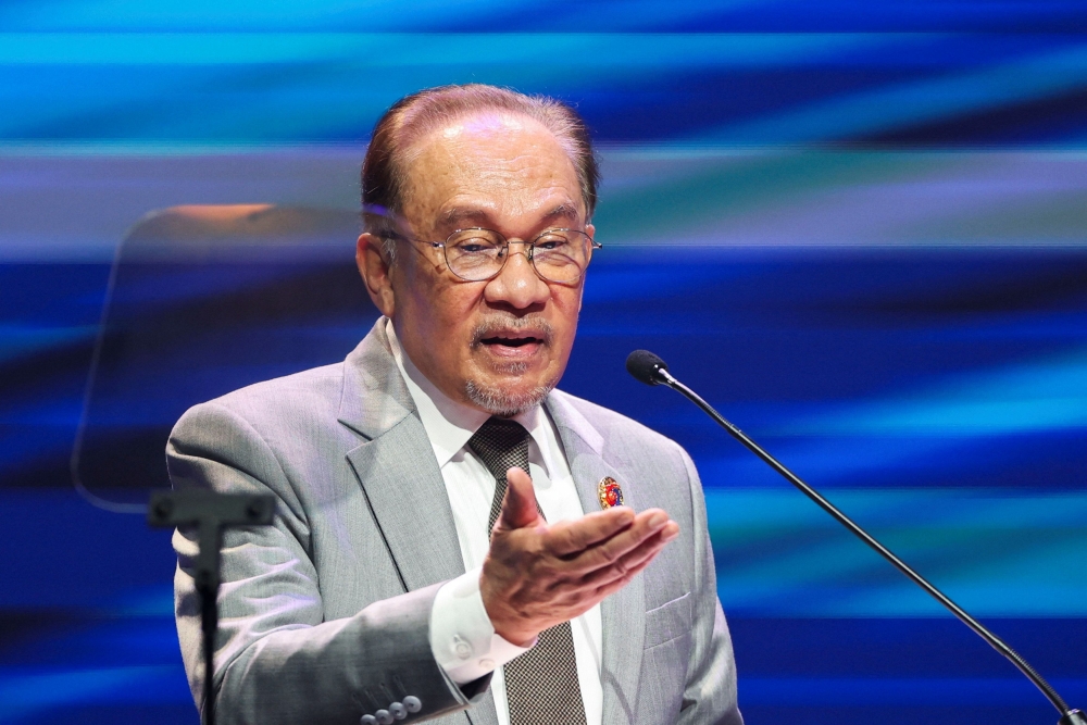 Malaysian Prime Minister Datuk Seri Anwar Ibrahim delivers his speech during the 58th Association of South-east Asian Nations Foreign Ministers' Meeting at Kuala Lumpur, July 9, 2025. — Reuters pic 