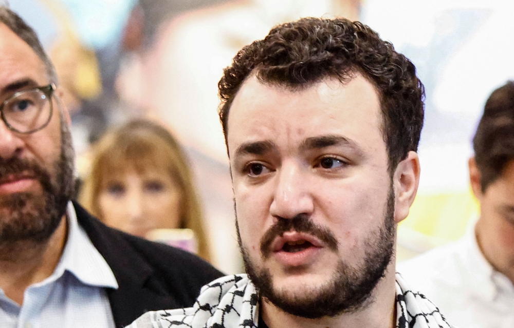 Former Columbia Univrsity student Mahmoud Khalil speaks to the press as he arrives at Newark airport in Newark, New Jersey June 21, 2025. Khalil, one of the most prominent leaders of US pro-Palestinian campus protests, sued the Trump administration on July 10, 2025 for US$20 million over his arrest and detention by immigration agents. — AFP pic