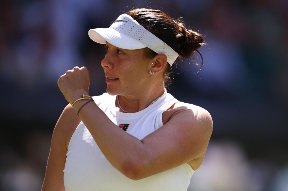 US player Amanda Anisimova celebrates winning the first game in the second set against Belarus's Aryna Sabalenka during their women's singles semi-final tennis match on the eleventh day of the 2025 Wimbledon Championships at The All England Lawn Tennis and Croquet Club in Wimbledon July 10, 2025. — Henry Nicholls/Pool/AFP pic 