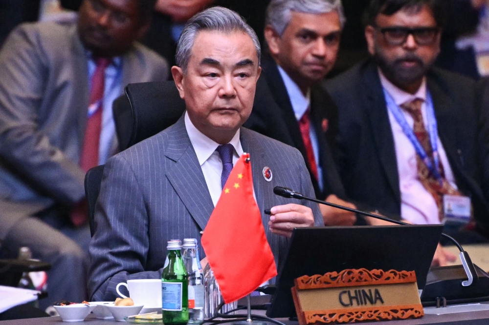 China's Foreign Minister Wang Yi attends the 15th East Asia Summit Foreign Ministers' meeting during the 58th Association of Southeast Asian Nations (ASEAN) Foreign Ministers' meeting and related meetings at the Convention Centre in Kuala Lumpur on July 11, 2025. — AFP pic