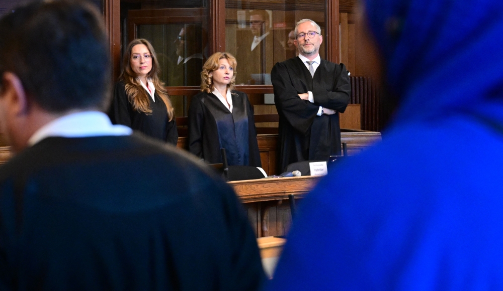 Court-appointed defence lawyers (from left) Klaudia Dawidowic, Ria Halbritter and Christoph Stoll wait for the start of the trial of a palliative care doctor accused of killing 15 patients with lethal injections, at the Berlin regional court on July 14, 2025. — AFP pic
