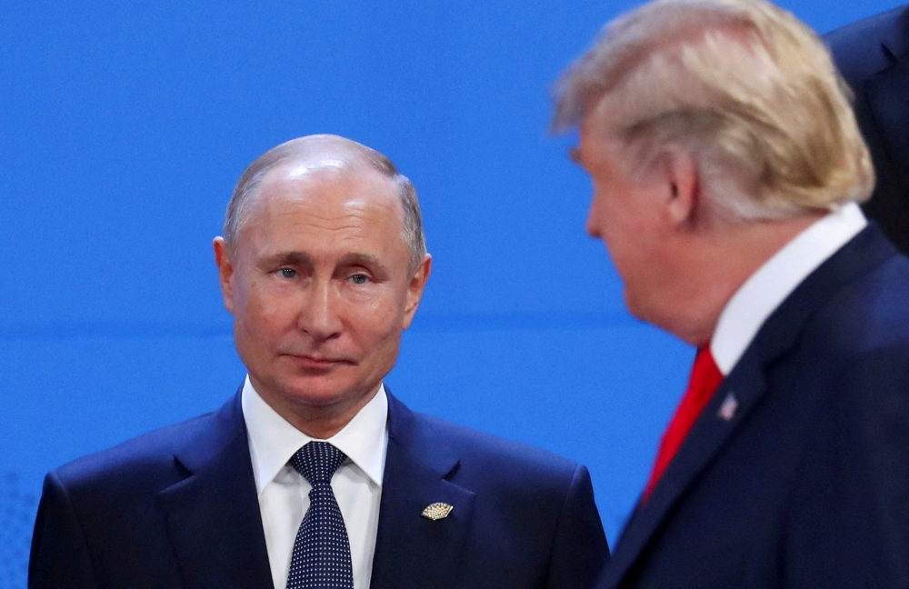 President Donald Trump and Russia's President Vladimir Putin are seen during the G20 leaders summit in Buenos Aires, Argentina November 30, 2018. — Reuters pic
