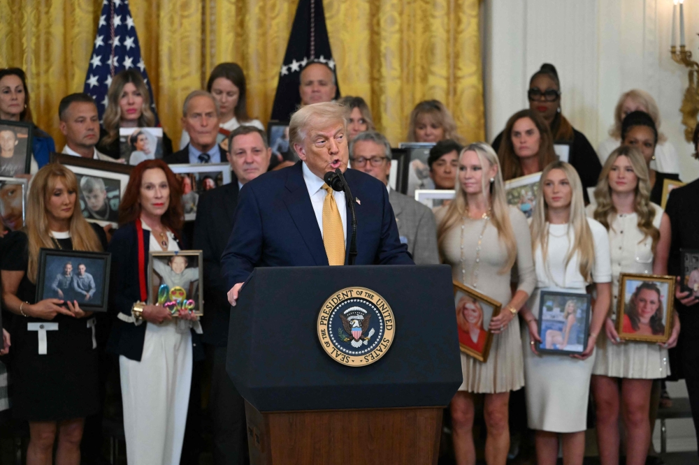 US President Donald Trump speaks before signing the Halt All Lethal Trafficking of Fentanyl Act, which strengthens prison sentences for fentanyl traffickers, at the White House. — AFP pic