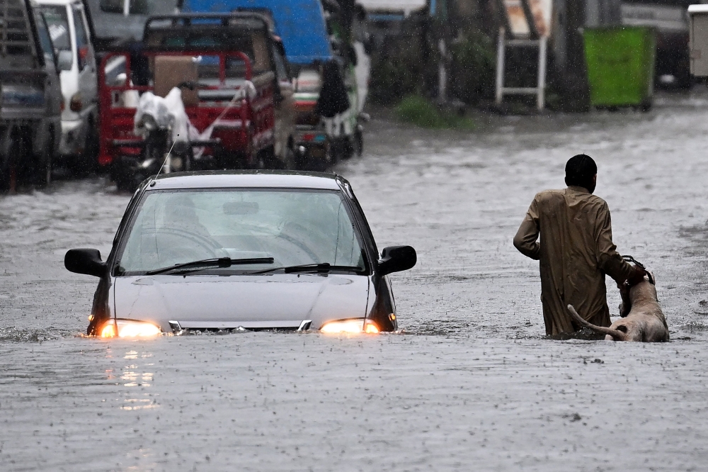Pakistan’s monsoon season has been linked to more than 110 deaths, including dozens of children, since it began in late June, according to government figures released on July 14. — AFP pic