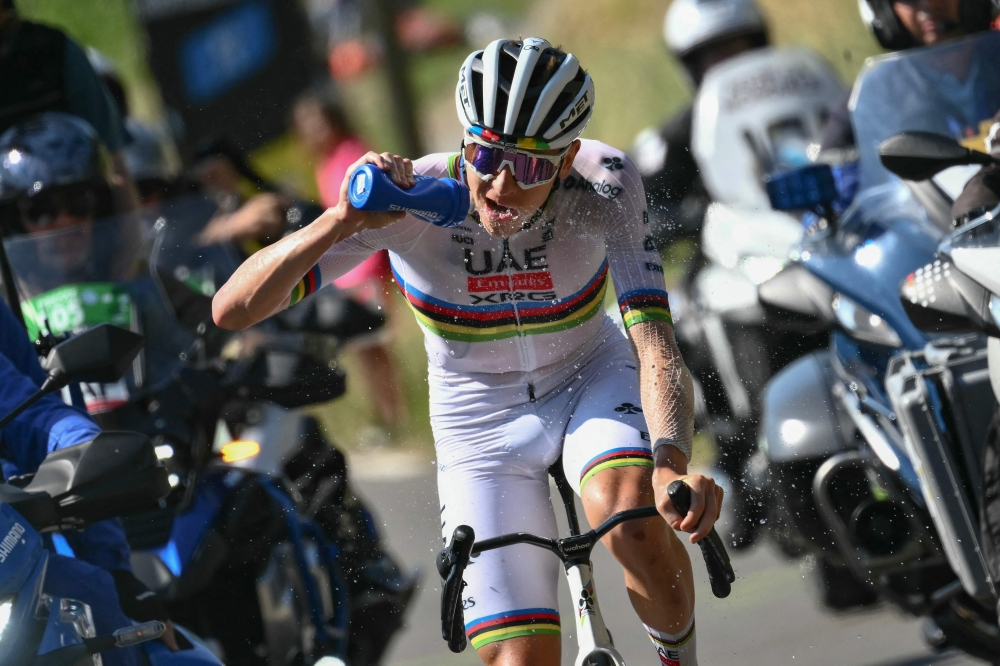 UAE Team Emirates–XRG team’s Slovenian rider Tadej Pogacar drinks as he cycles in the ascent of Hautacam during the 12th stage of the 112th edition of the Tour de France cycling race, 180.6 km between Auch and Hautacam, in the Pyrenees mountains of southwestern France, on July 17, 2025. — AFP pic