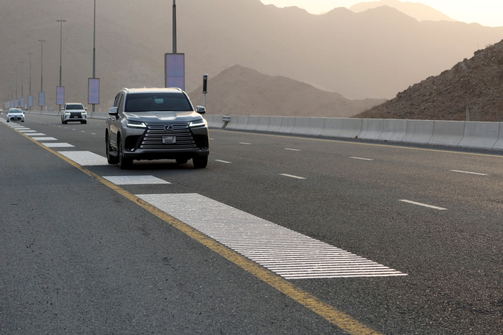 Vehicles drive over rumble strips that play Ludwig van Beethoven’s Ninth Symphony on a highway dubbed ‘Musical Road’ in Fujairah, United Arab Emirates, July 15, 2025. — Reuters pic