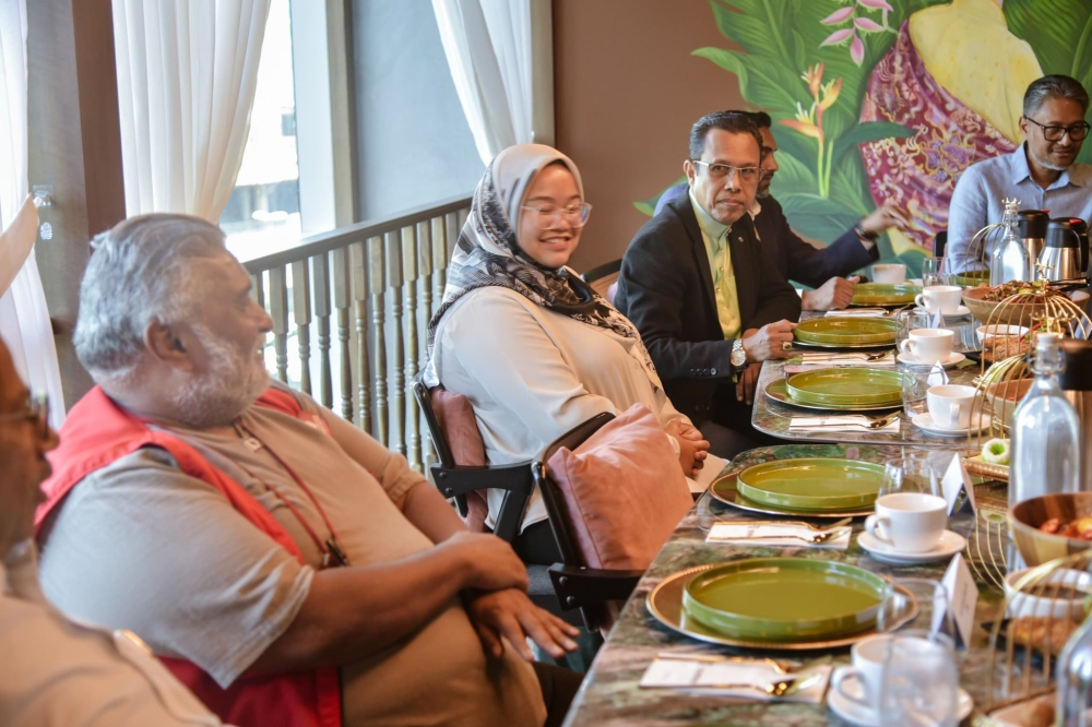 Socialist Party of Malaysia (PSM) deputy chair S Arutchelvan (left) seen attending the meeting called by Tan Sri Muhyiddin Yassin. — Picture from Facebook/Muhyiddin Yassin