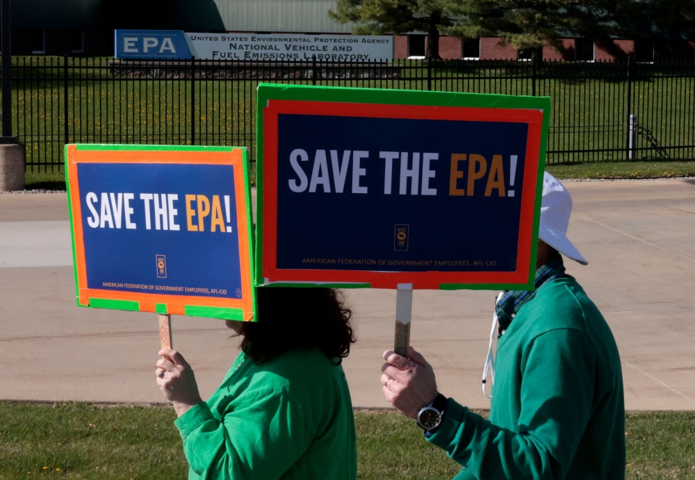 Demonstrators march during a “Hands off the EPA” rally outside the Environmental Protection Agency offices in Ann Arbor, Michigan, on Earth Day, April 22, 2025. — AFP pic