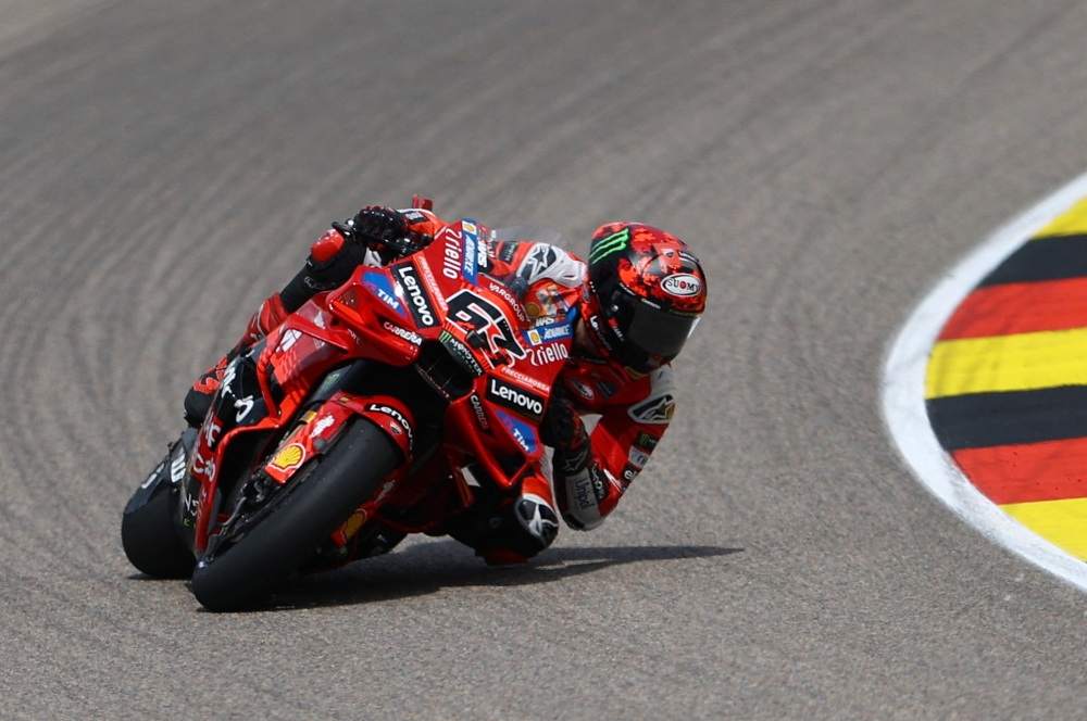 Francesco Bagnaia crossed the line with the fastest time of one minute and 52.303 seconds in mostly sunny conditions in Brno, Czech Republic today. — Reuters pic