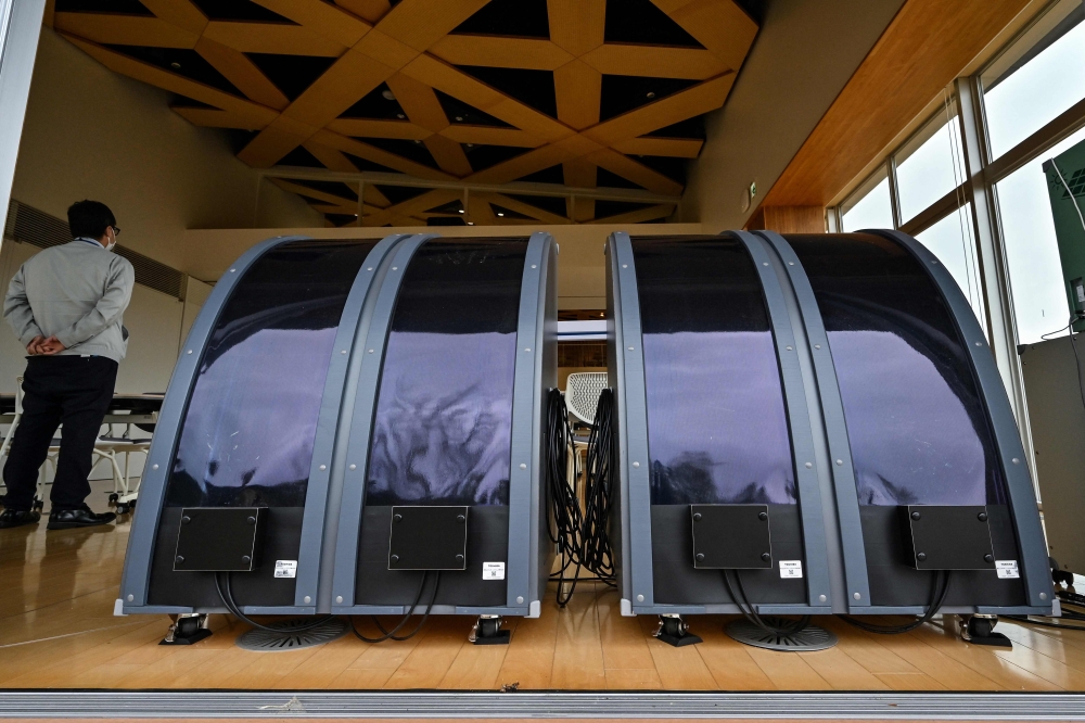 This photo taken on April 24, 2025 shows perovskite solar panels on display at the Okuma Town Hall in Okuma, Fukushima prefecture. — AFP pic
