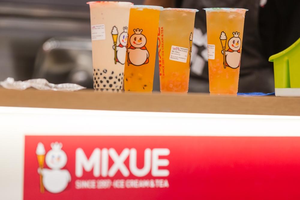 Beverages are seen on a counter at a Mixue outlet in Kuala Lumpur on September 19, 2024. — Picture by  Raymond Manuel