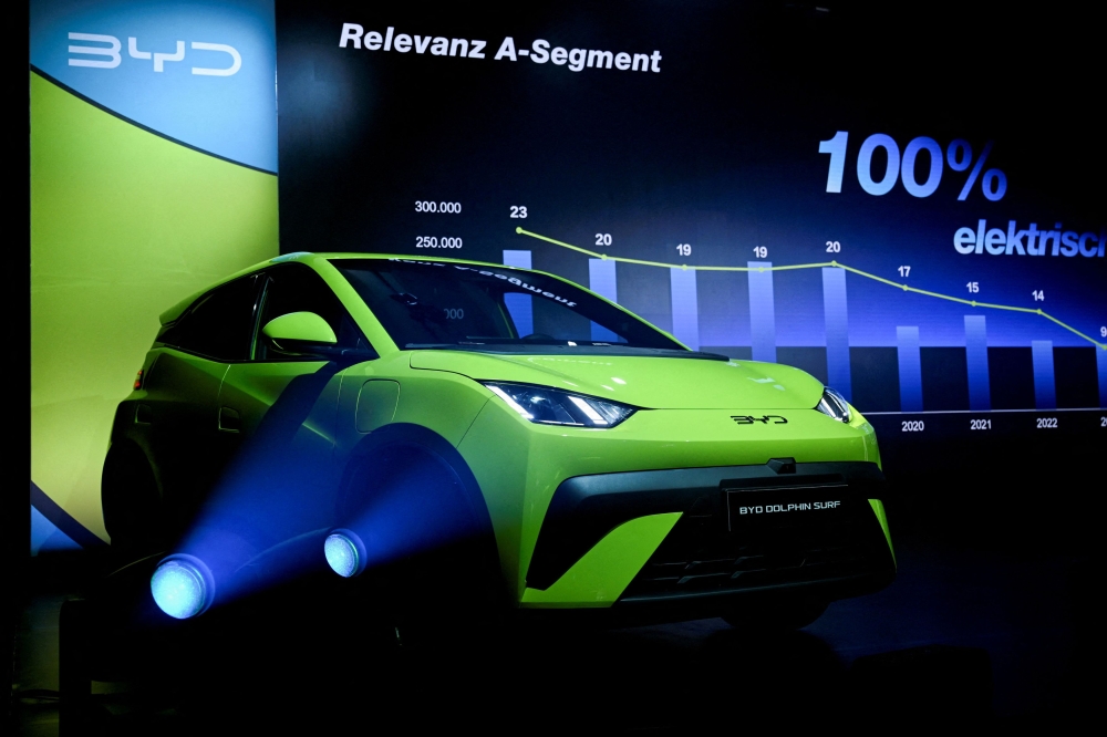A BYD Dolphin Surf electric vehicle is displayed on stage during a presentation by BYD carmaker in Berlin, Germany May 21, 2025. — Reuters pic