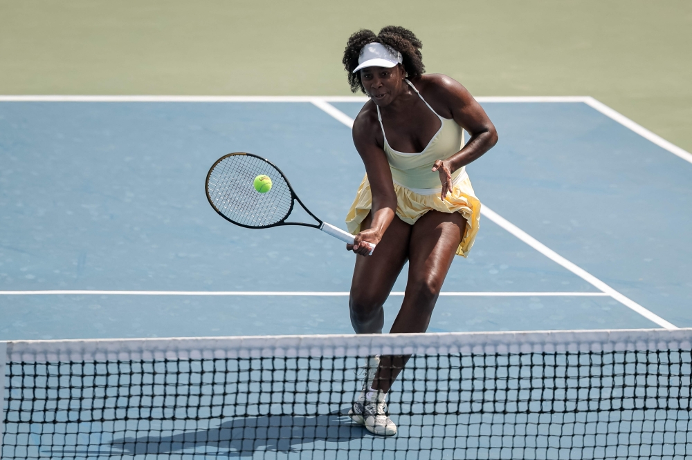 Venus Williams returns a shot during a women's doubles match at the Mubadala Citi DC Open 2025 on July 21, 2025, in Washington, DC. — AFP pic