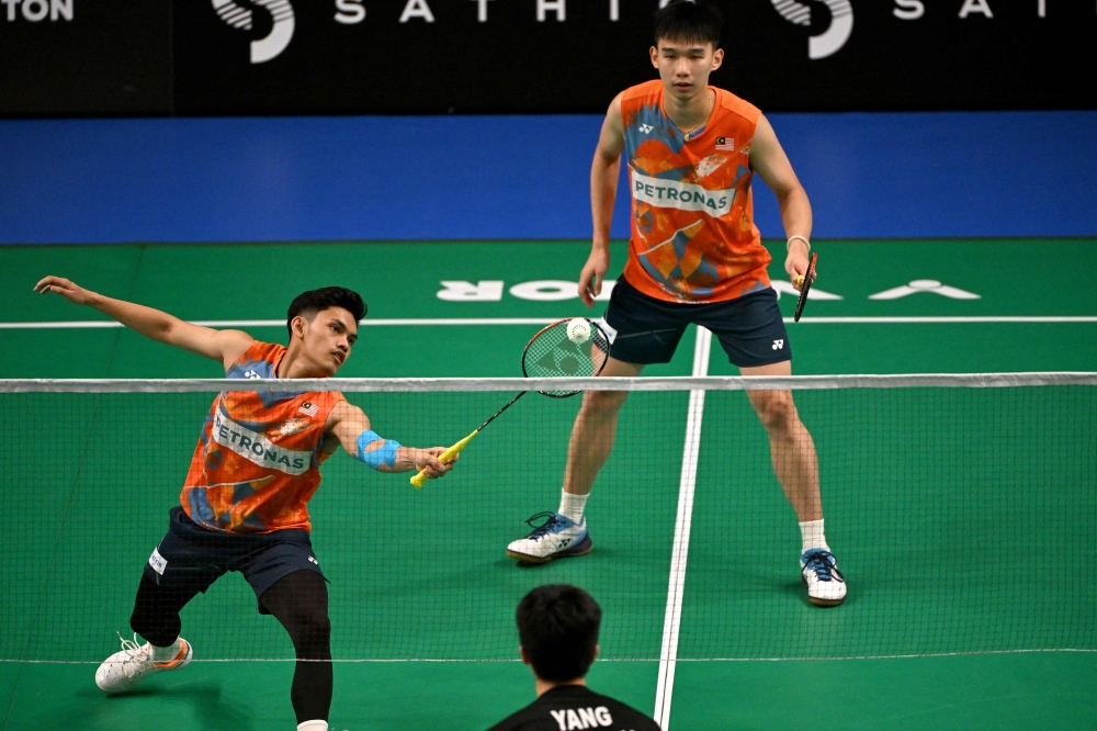 The world No. 53 pair were shown the exit in the Super 1000 tournament by Indonesia’s world No. 210 duo, Fajar Alfian-Muhammad Shohibul Fikri, who beat them 21-11, 21-10 in just 23 minutes. — AFP pic