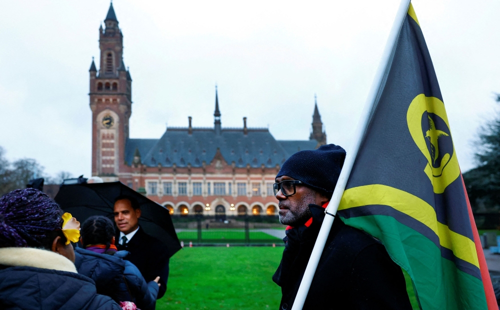 Tuvalu delegation arrives for the United Nations' top court International Court of Justice (ICJ)'s public hearings in an advisory opinion case, that may become a reference point in defining countries' legal obligations to fight climate change, in The Hague, Netherlands, December 2, 2024. — Reuters pic