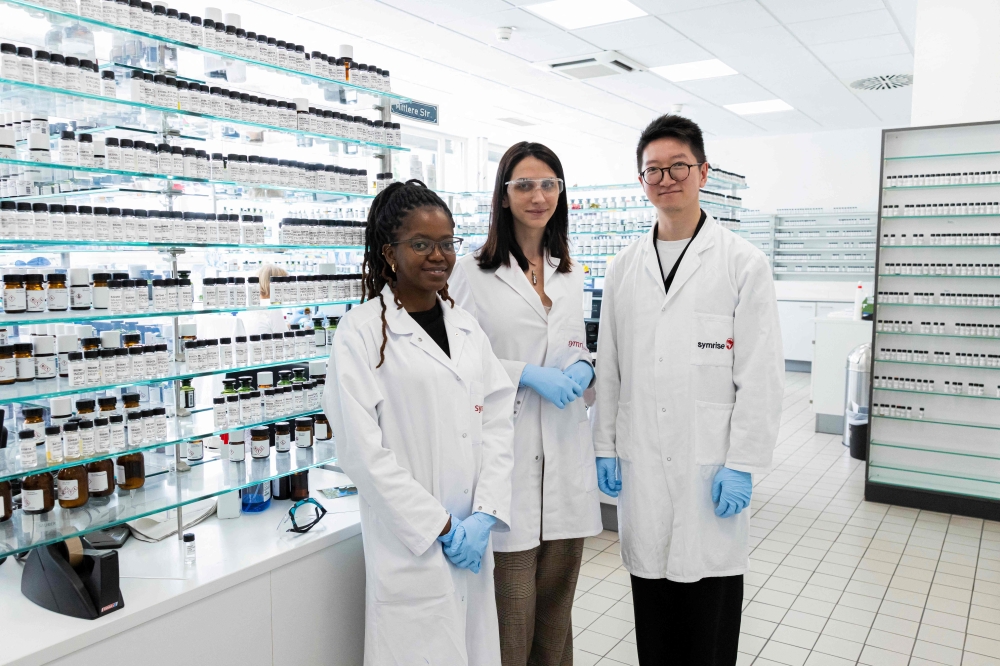 Junior perfumers (from left) Attiya Setai, Shangyun Lyu and Alicia de Benito Cassado stand in a mixing room at the Symrise company, where perfume oil formulas are developed, in Holzminden, central Germany July 8, 2025. — AFP pic 