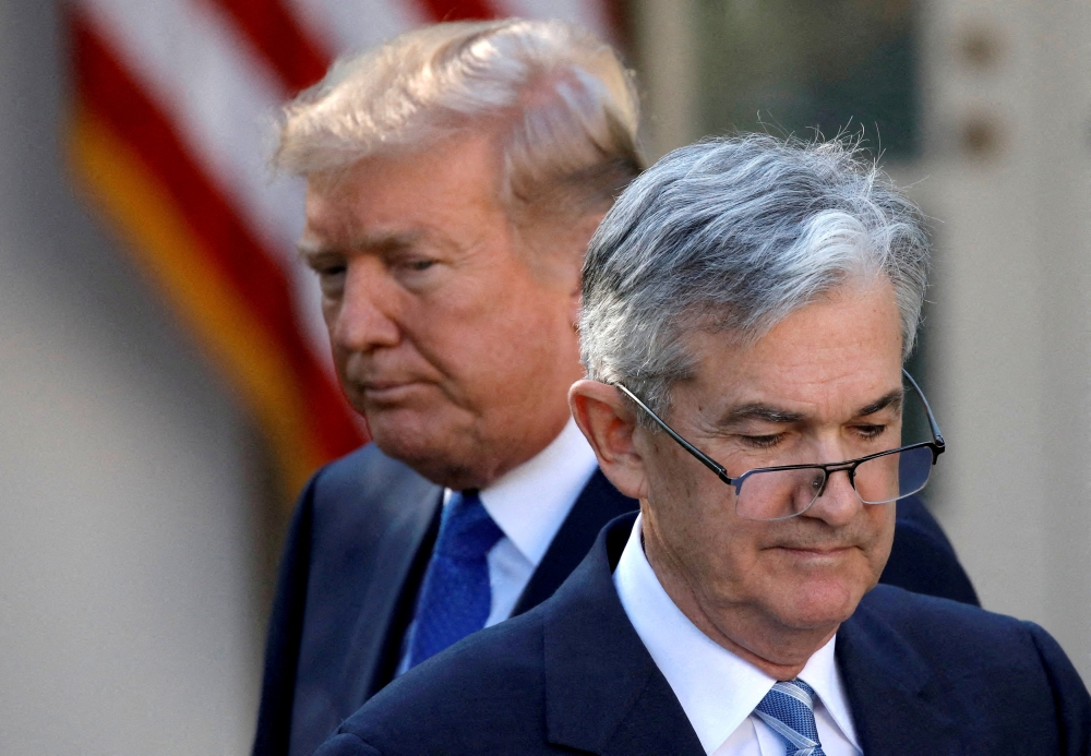 US President Donald Trump looks on as Jerome Powell, his nominee at the time to lead the US Federal Reserve, moves to the podium at the White House in Washington November 2, 2017. — Reuters pic