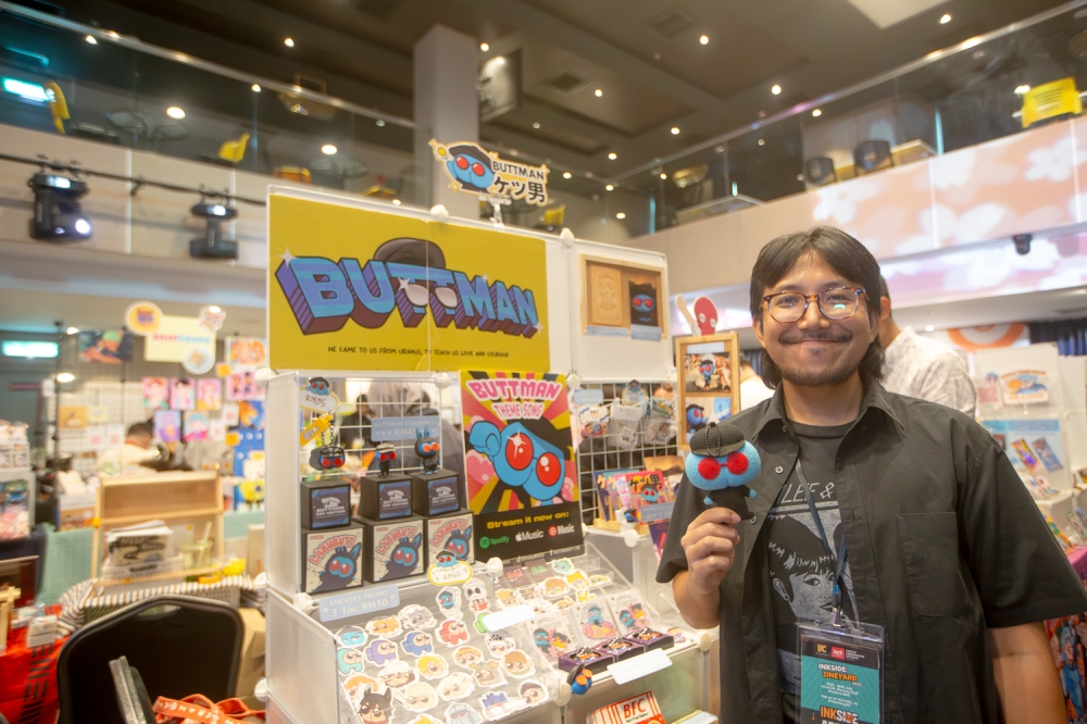Suf Bansen, a voice actor and indie artist, experienced his first zine fair at INKSIDE and shared hopes of attending more in the future. — Photo by Raymond Manuel