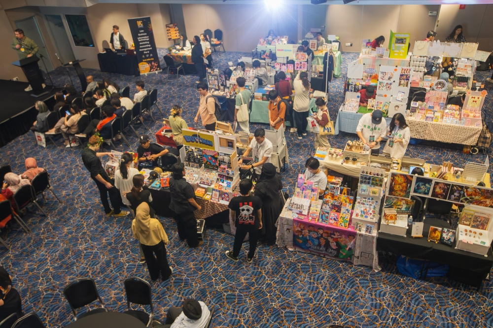 The zine fair at Menara BAC drew a strong crowd, with many attendees showing appreciation for local indie art. — Photo by Raymond Manuel