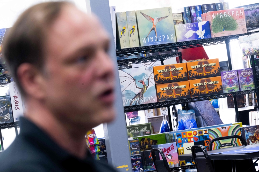 Games for sale that are made overseas, including in China, are seen for sale on a store shelf as Boyd Stephenson, owner of Game Kastle, speaks about the effects of tariffs on his store at his store in College Park, Maryland, July 24, 2025. — AFP pic