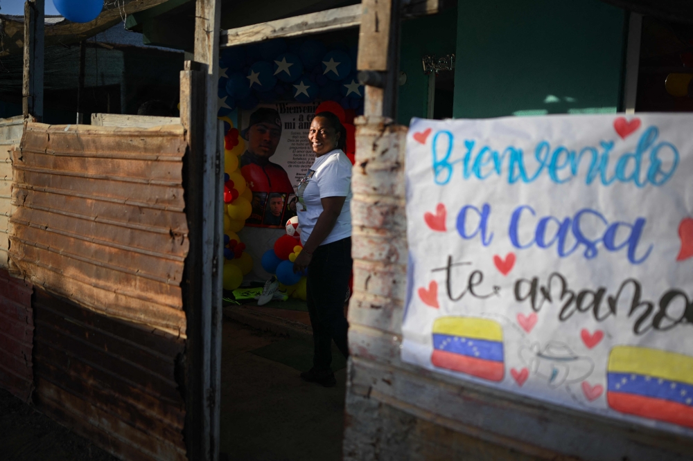 Yarelis Herrera awaits the arrival of her son, Edwuar Hernandez, who was repatriated from a jail in El Salvador, at their home in Maracaibo, Venezuela, July 22, 2025. — AFP pic