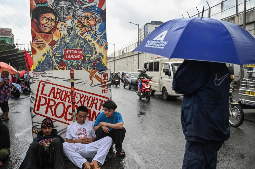 Protesters stage a rally in Quezon City, suburban Manila on July 28, 2025 to coincide with the State of the Nation address by Philippines' President Ferdinand Marcos Jr. — AFP pic